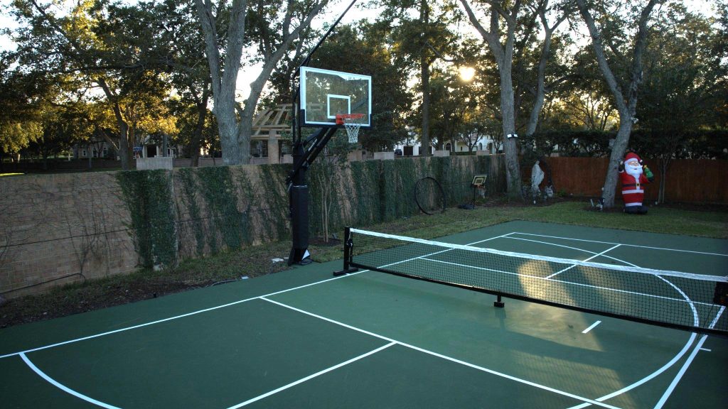 Houston green multi sport court for pickleball and basketball with hoop and removable net