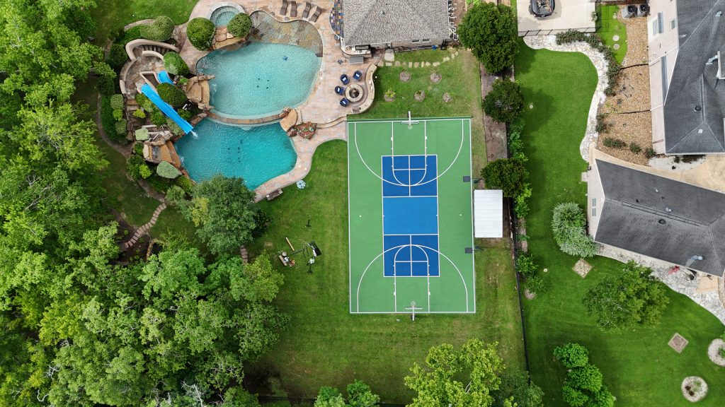 Multi-sport court surfacing for full basketball and pickleball in Missouri City, TX by Build My Courts