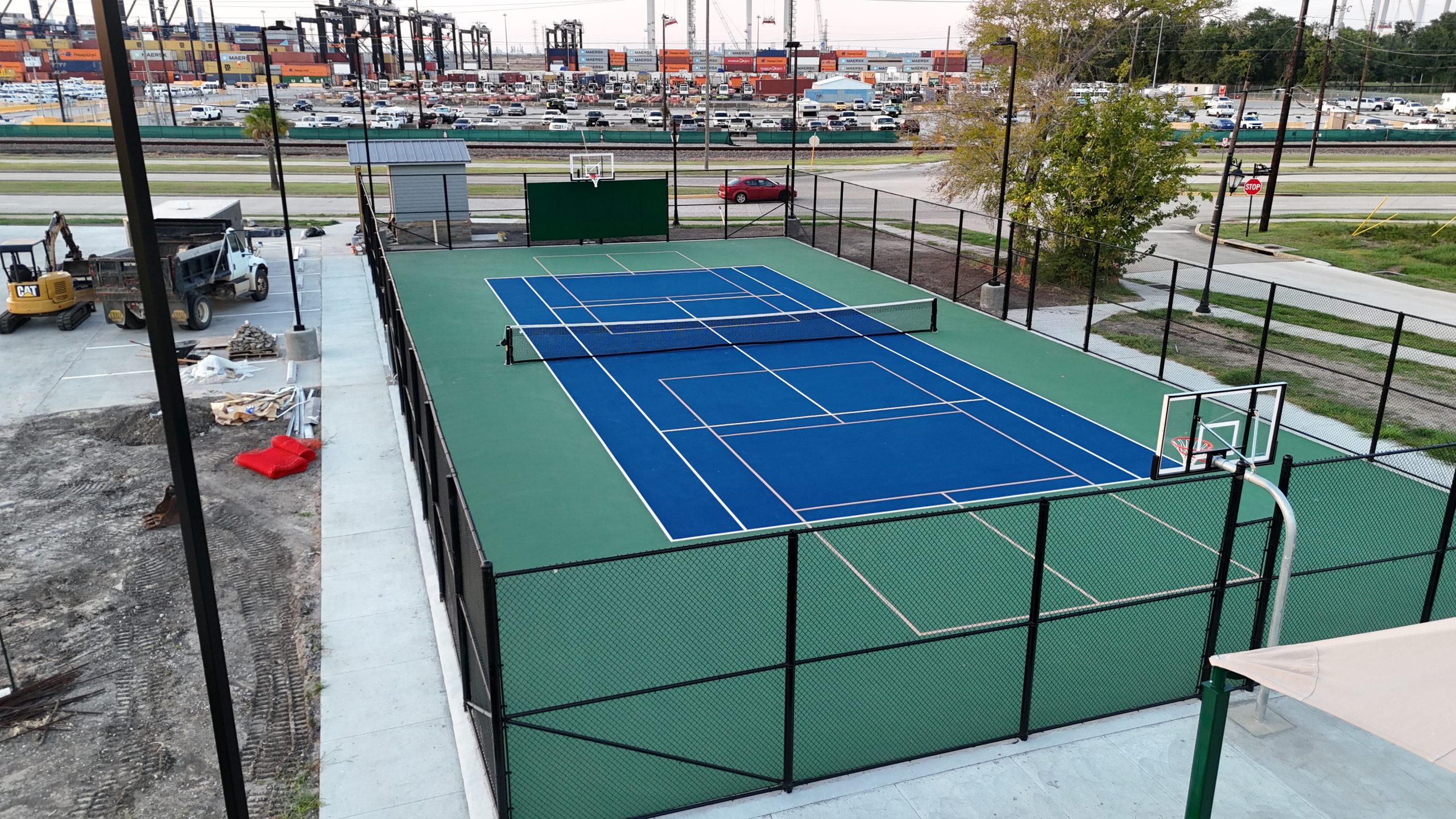Build My Courts team installing a multi-court at Morgon's Point, La Porte, TX, for pickleball, tennis, and basketball