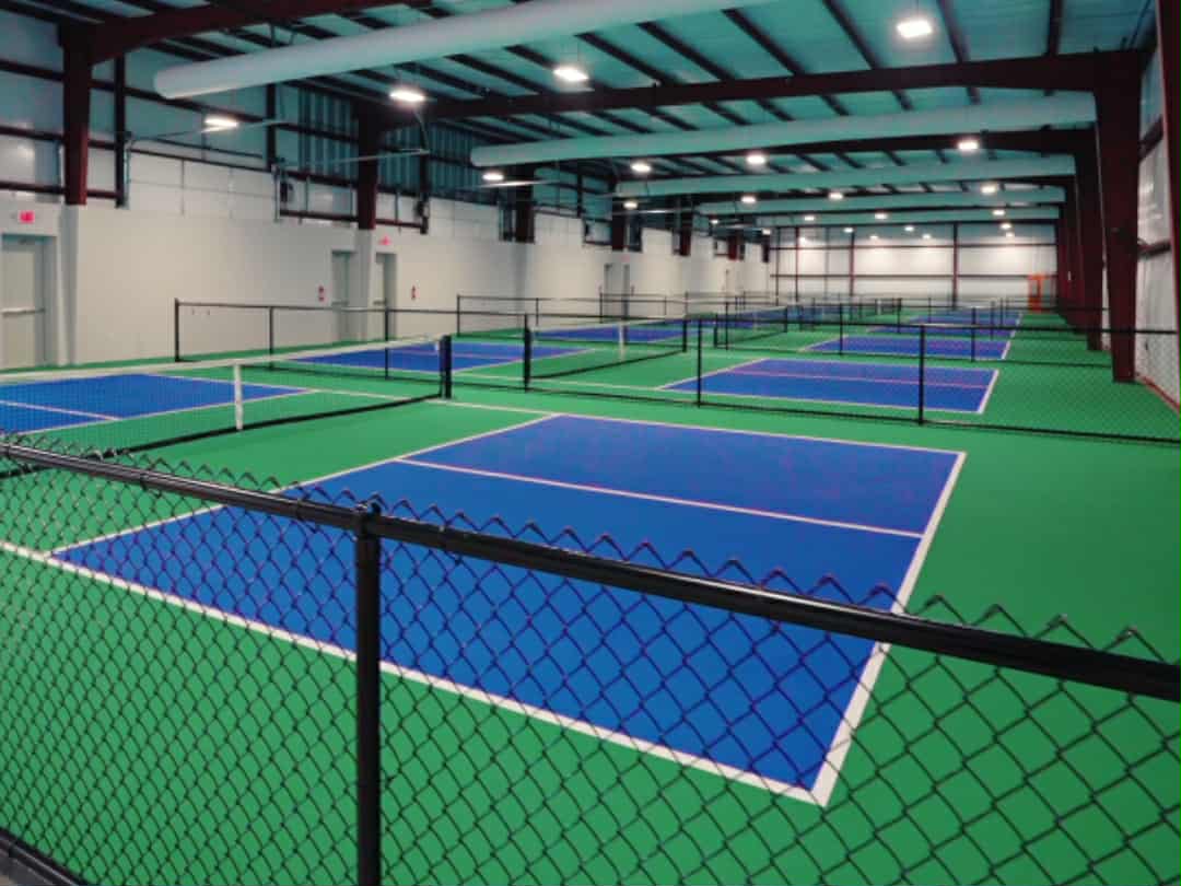 Indoor pickleball court at Slammin Pickle facility in Tomball, Texas